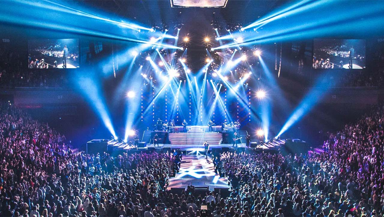 A concert with plenty of strobe lights.