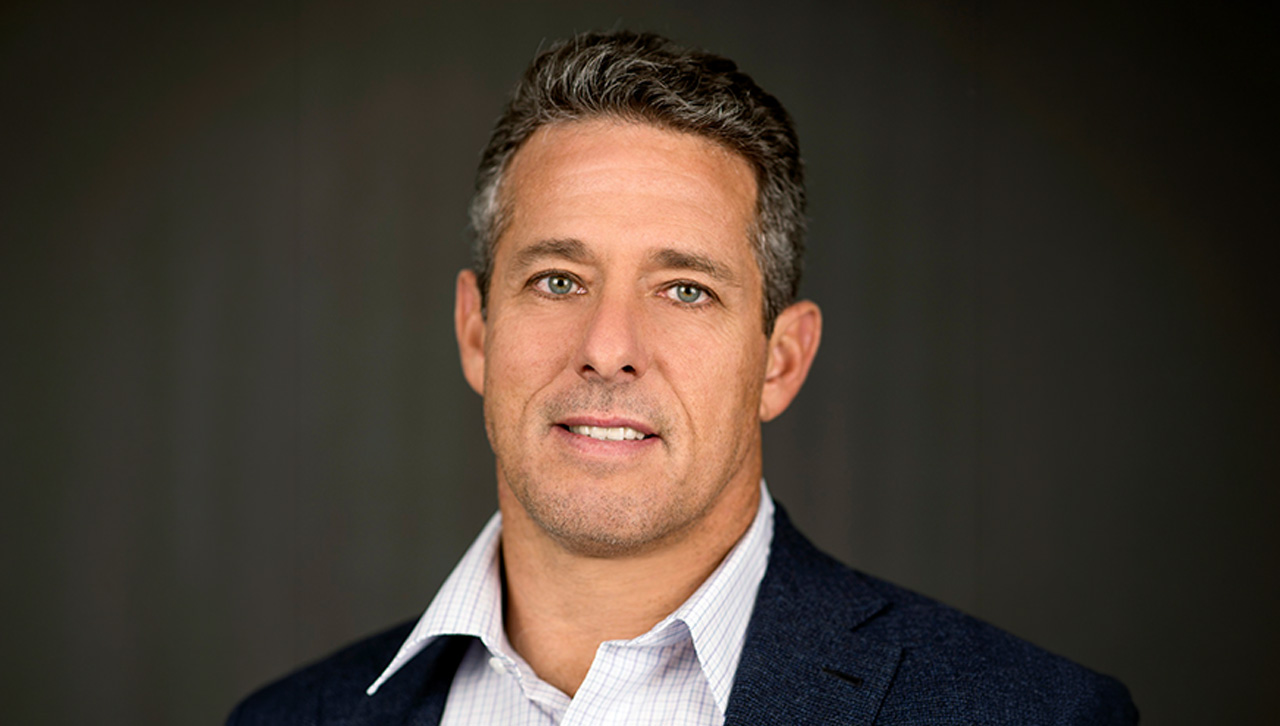 A headshot of Ricky Sandler